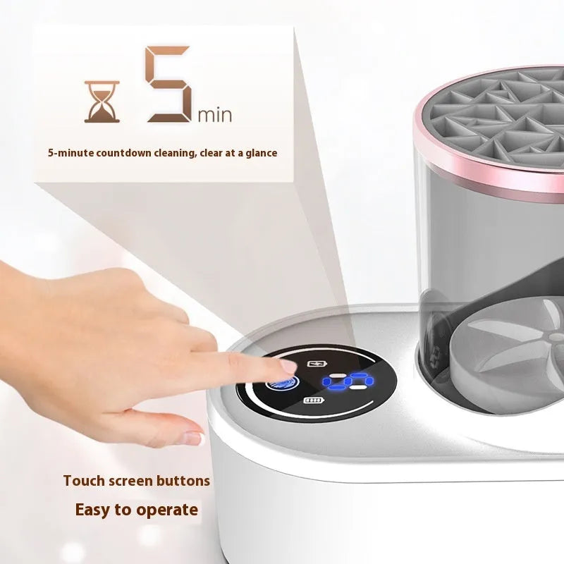 White rechargeable electric makeup brush cleaner with drying chamber on a vanity table.