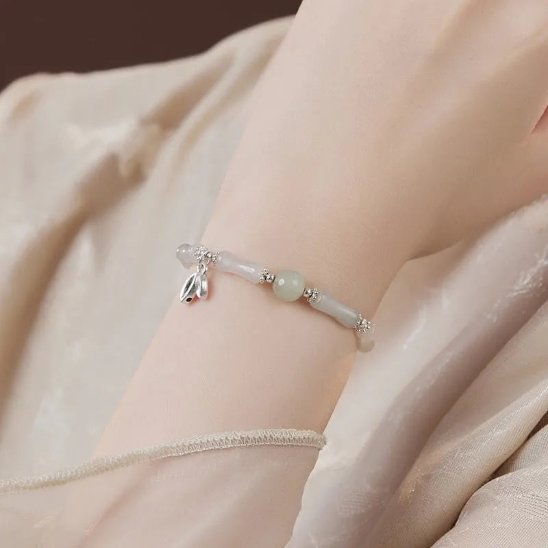 Silver-coloured antique-style bracelet made from natural Tianshan green bamboo with bamboo joint detailing.