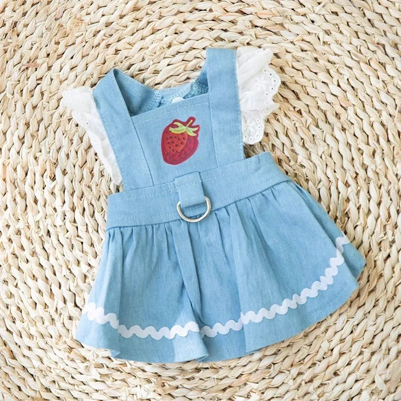 Strawberry print denim dog skirt with traction dots on Bondi Blue background