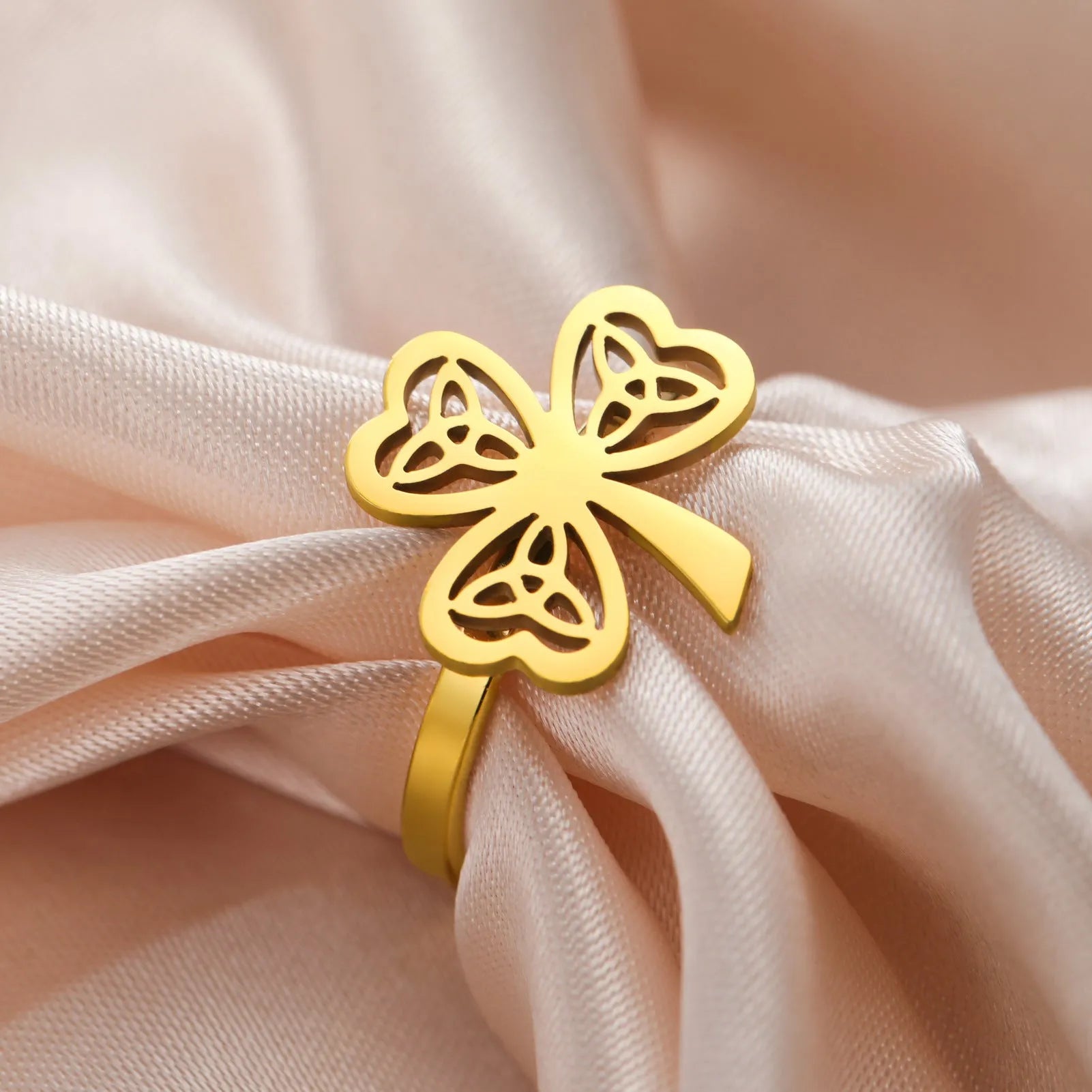Stainless steel lucky hollow ring in gold or steel colour on size display