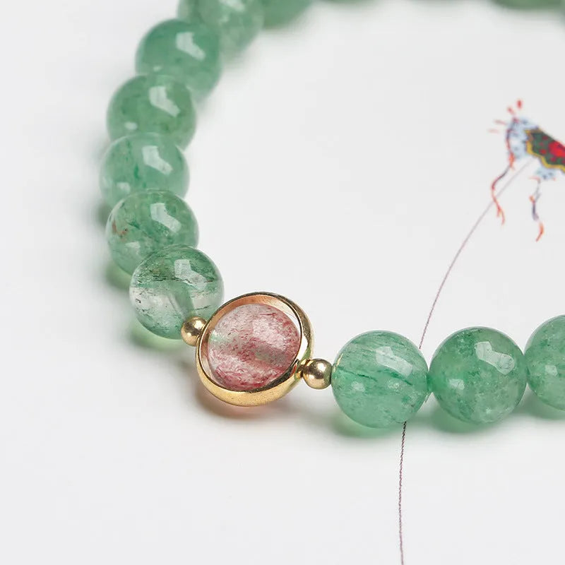Natural green strawberry quartz bracelet with 7.5mm beads in geometric pattern