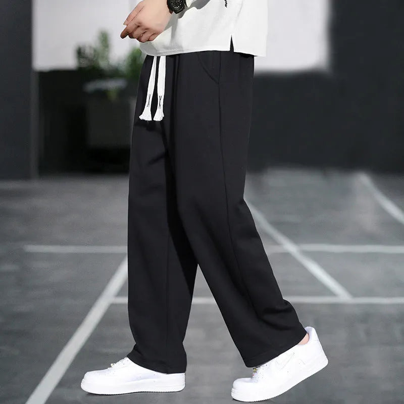 Men's grey bamboo fibre sports trousers with multiple pockets and high waist design