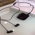 Bluetooth lavalier headset in black, grey, red, or white with 10-metre wireless range.