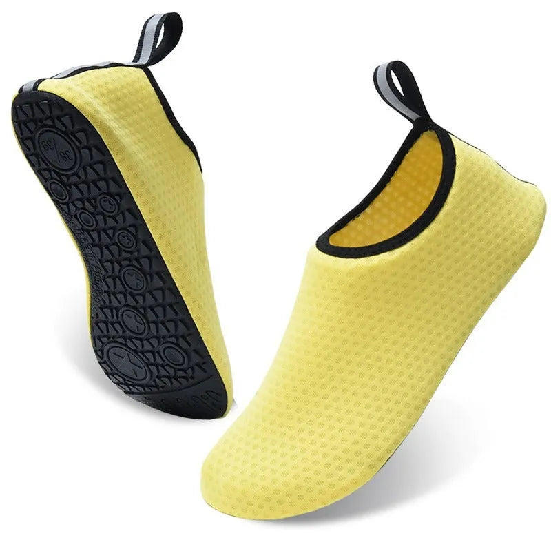Non-slip water shoes with elastic band and mesh upper in Snowflake Mesh blue pattern.