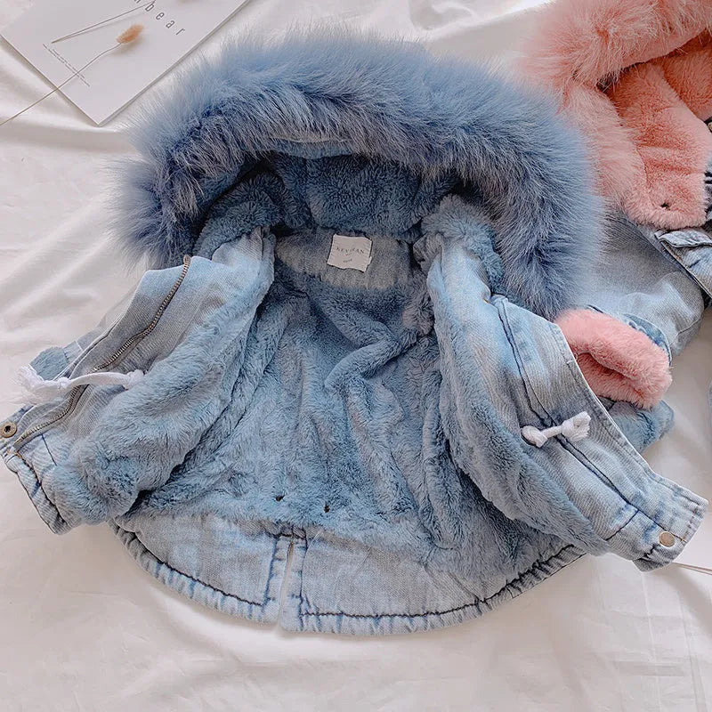 Blue denim coat for a girl with a non-removable hood and pink lining visible.