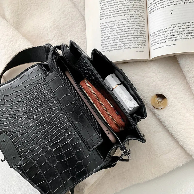 Vintage PU leather crossbody bag in black, shown with dimensions 20cm wide by 14cm high