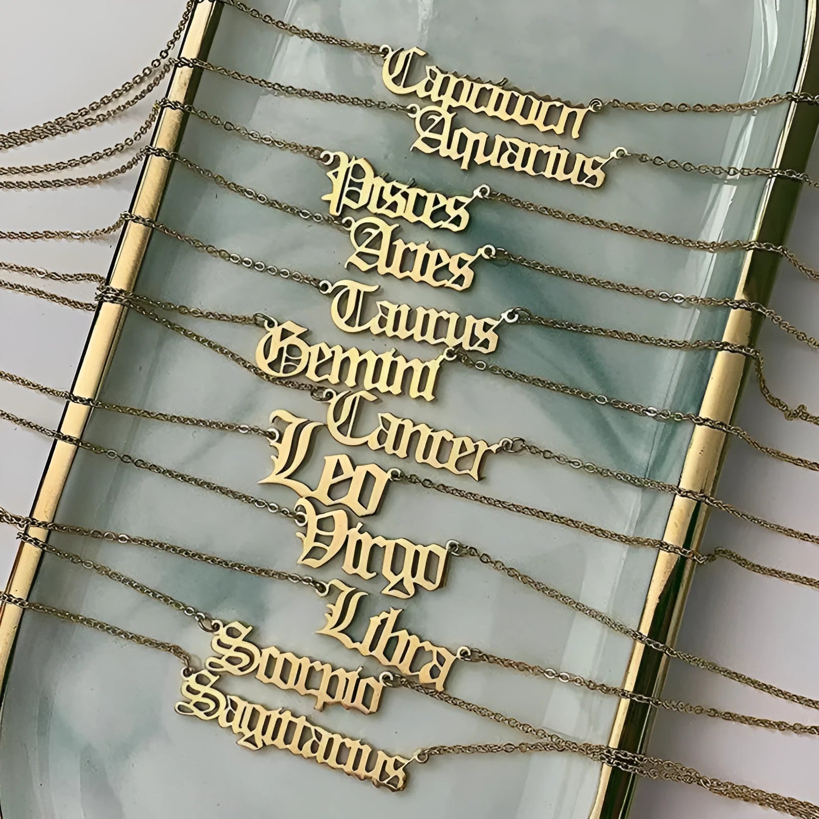 Alloy zodiac Old English pendant necklace showing a single zodiac letter on a chain