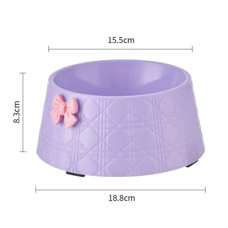Pet food bowl with diamond pattern and a decorative bow design in a choice of colours.