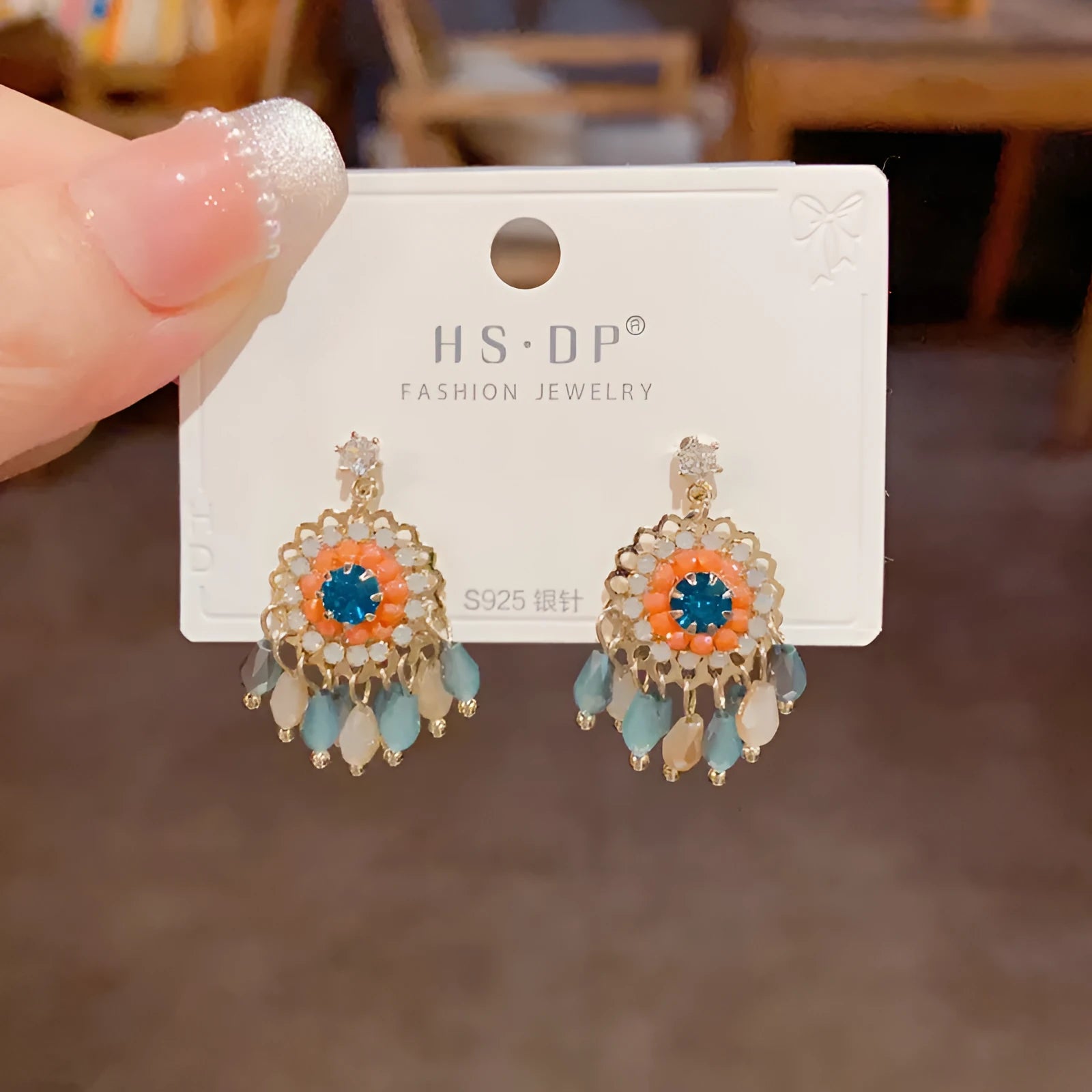 Geometric diamond-embedded crystal tassel earrings in thick gold-plated copper, purple and blue colour options