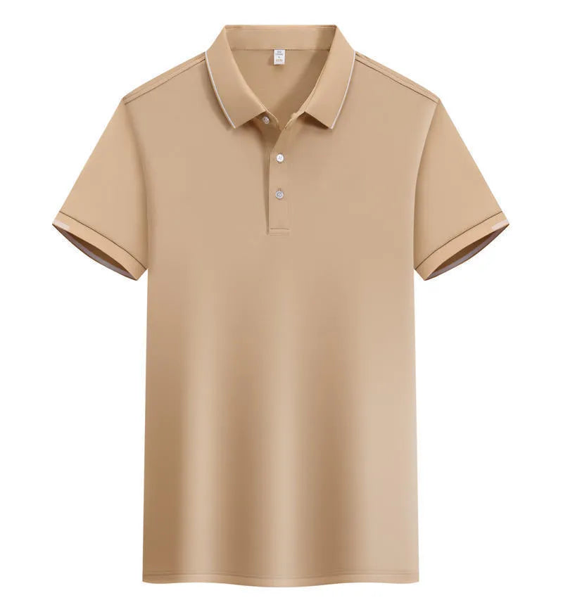 Man wearing a loose fit apricot coloured short sleeve cotton blend polo shirt.