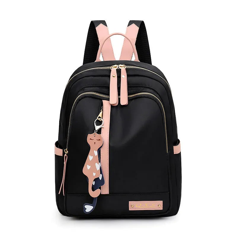 Men's black nylon casual backpack with double straps, a soft handle, and external pocket.