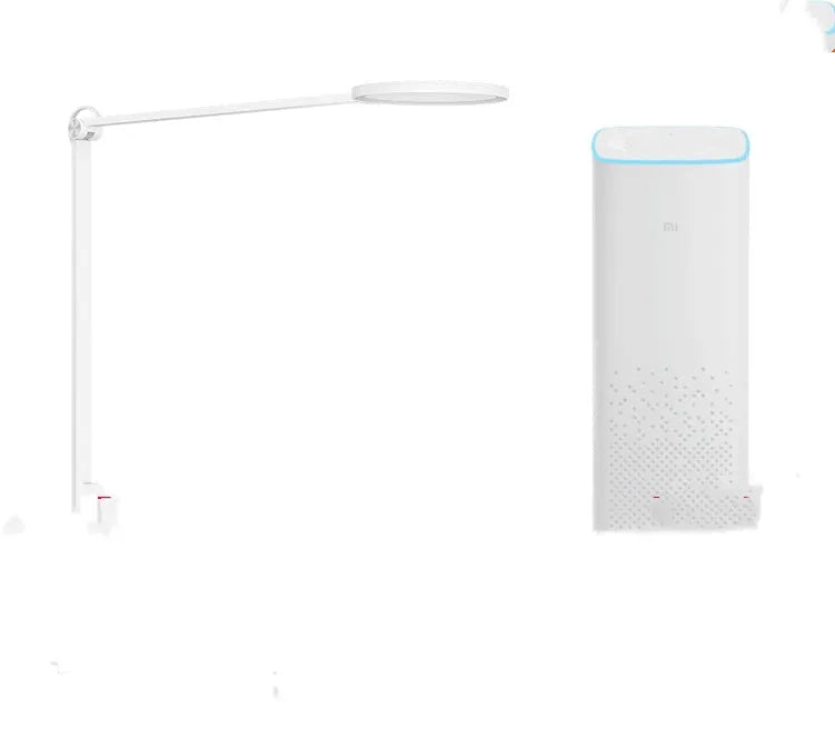 ProLED intelligent folding desk lamp with adjustable arm on a wooden desk.