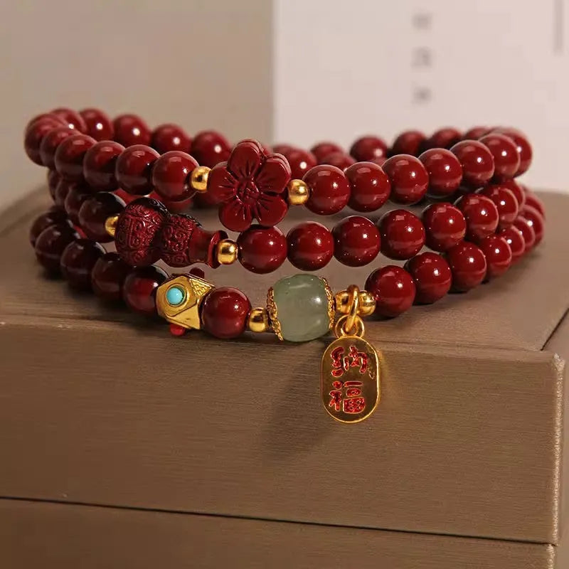 Red cinnabar bracelet with multi-circle gourd and five-petal flower geometric design