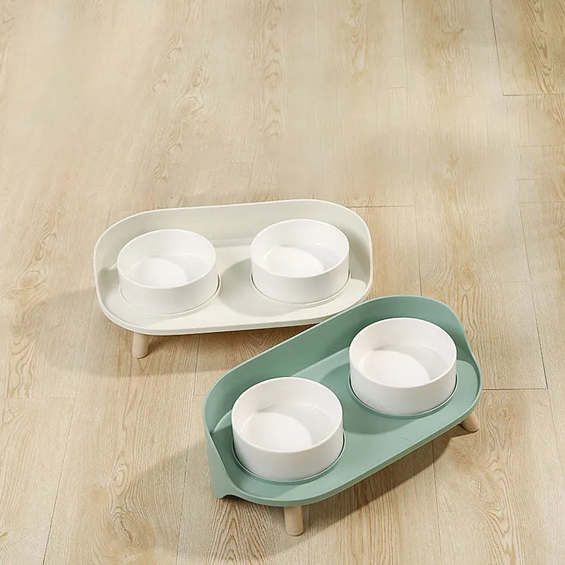 Green adjustable double-bowl pet feeder with tilted design for cervical support