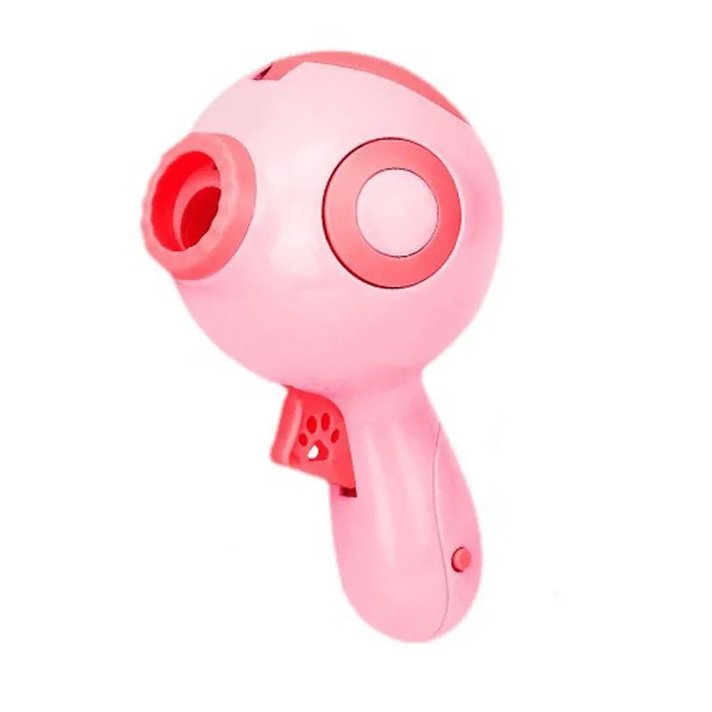 Green, orange, and pink plastic interactive dog treat launcher and slow feeder toy.