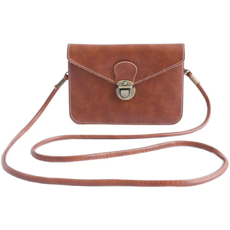 Retro soft surface messenger bag with lock closure showing wine red colour option