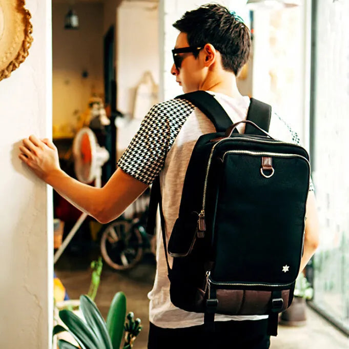 Men's Korean style Oxford cloth backpack in army green colour showing dimensions and design