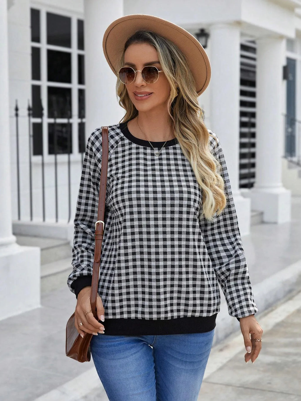 Black long sleeve women's pullover sweater with a Japanese sweet plaid and stripe print pattern.