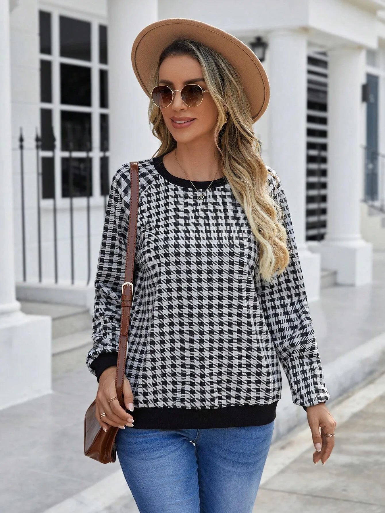 Black long sleeve women's pullover sweater with a Japanese sweet plaid and stripe print pattern.