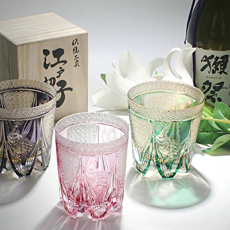 Crystal whiskey glass in simple style, colour Bluish Gray Fluorite, on a table