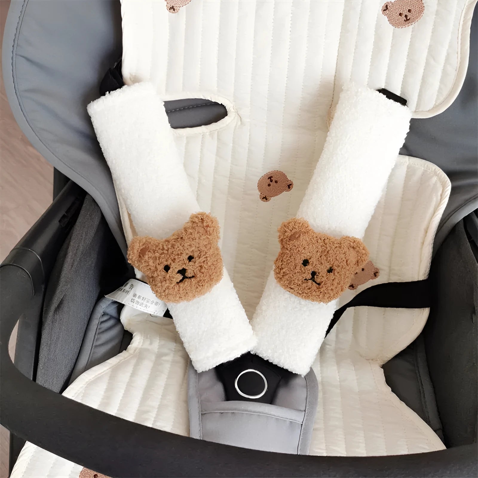 Cartoon bear plush seat belt shoulder cover for child car safety measuring 25cm by 6.5cm by 5cm.