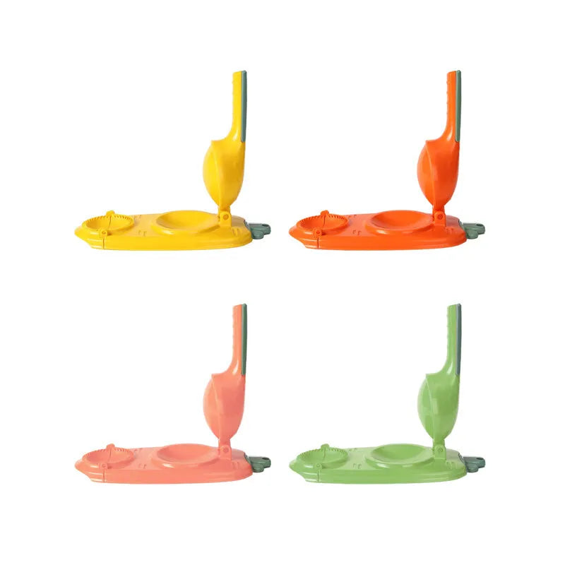 Orange and white plastic dumpling maker tool with ergonomic handle and hanging hole
