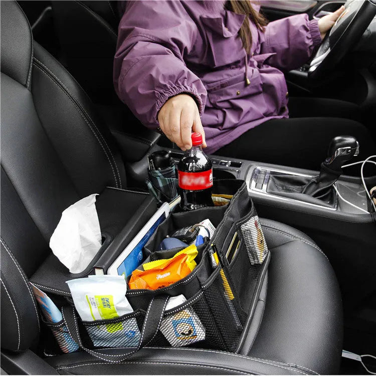 Black oxford cloth car boot storage box organiser measuring 33cm by 33cm by 16cm.