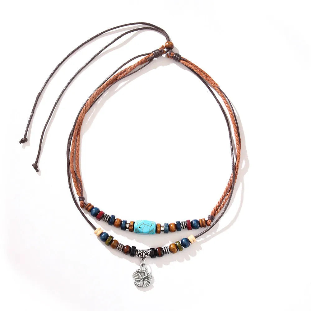 Men's geometric alloy pendant necklace with turquoise colour on wax rope chain