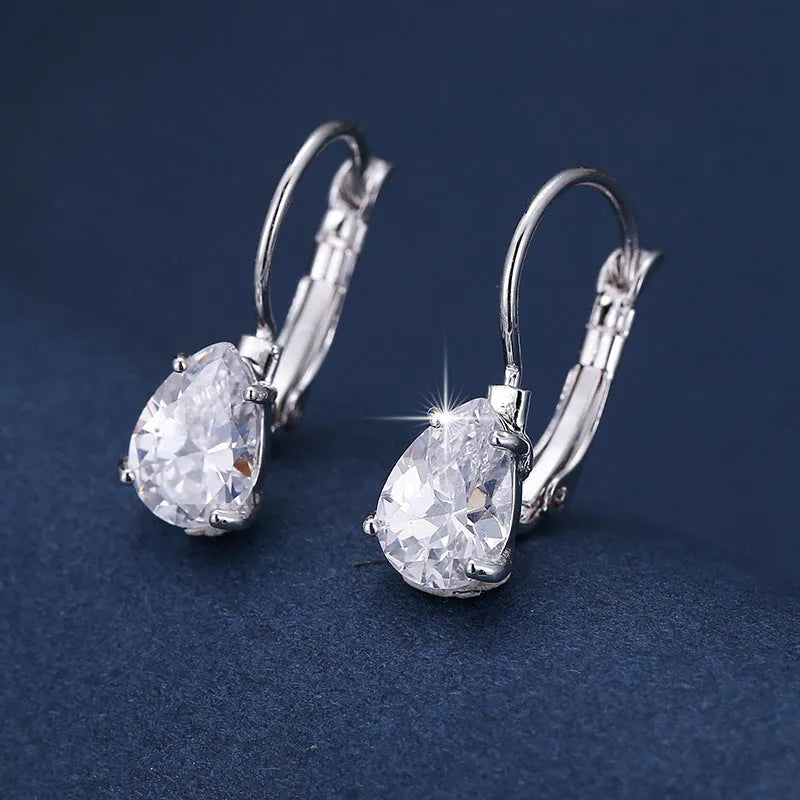 Women's drop-shaped metal earrings with platinum gemstone decoration in gold and platinum colour options