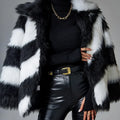 Faux fur coat with contrast lapel and detachable fur collar in shown colour.