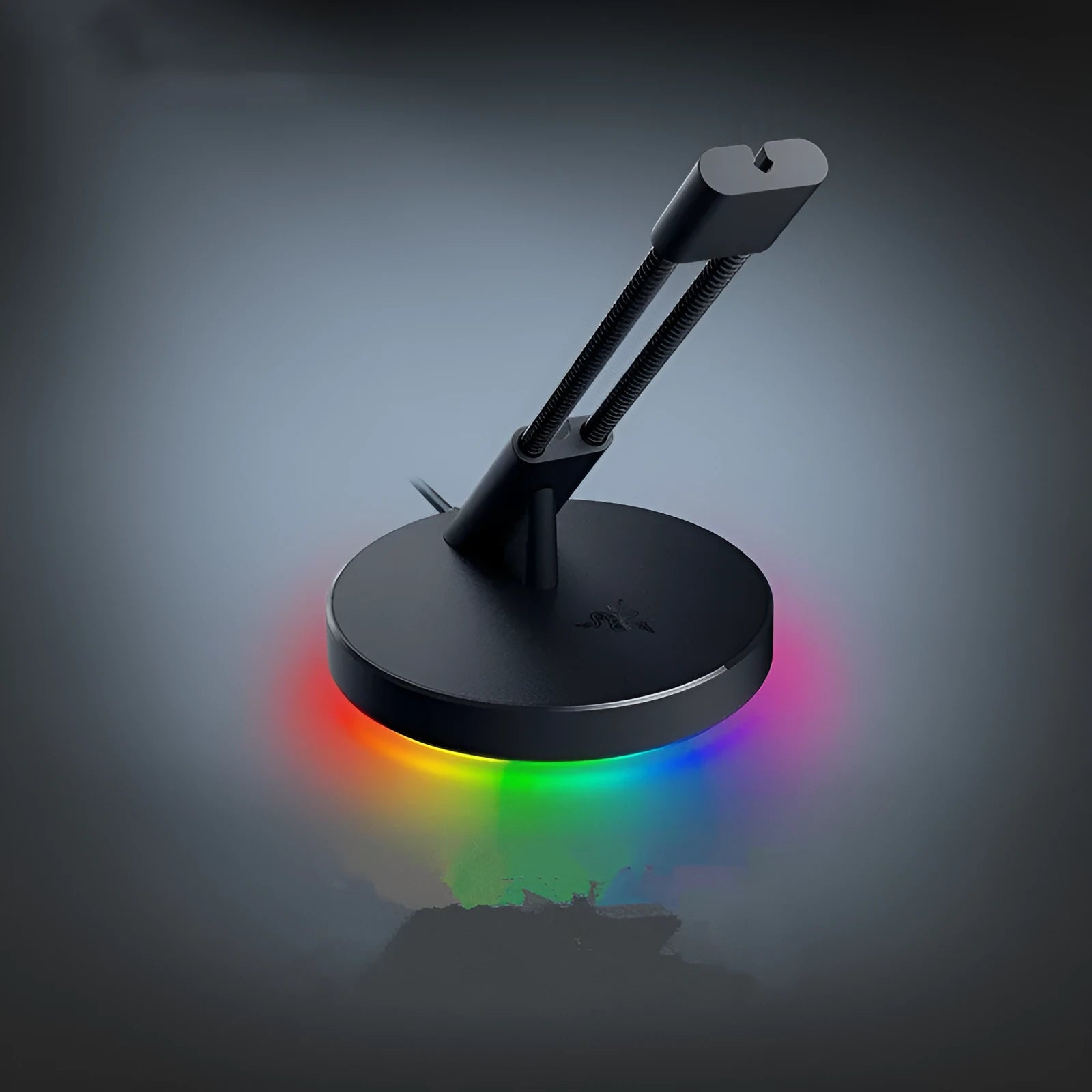 Thunder Snake mouse cable fastener with RGB lighting on a gaming desk