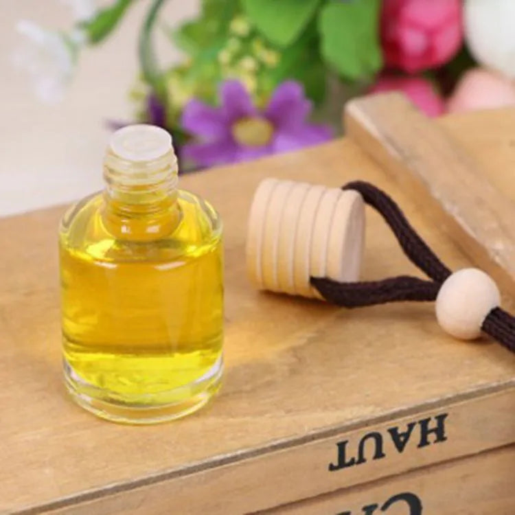 Glass bottle car air freshener hanging ornament with 55g fragrance options including lavender, lemon, apple, strawberry, ocean, and floral scents