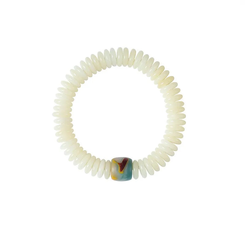Tibetan white bodhi seed Buddhist bracelet or handheld mala with traditional knotting