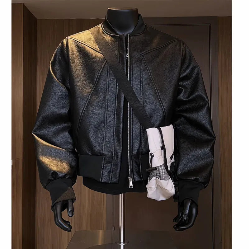 Men's black PU leather jacket with litchi grain texture, shown in a tight-fitting, extended length design.
