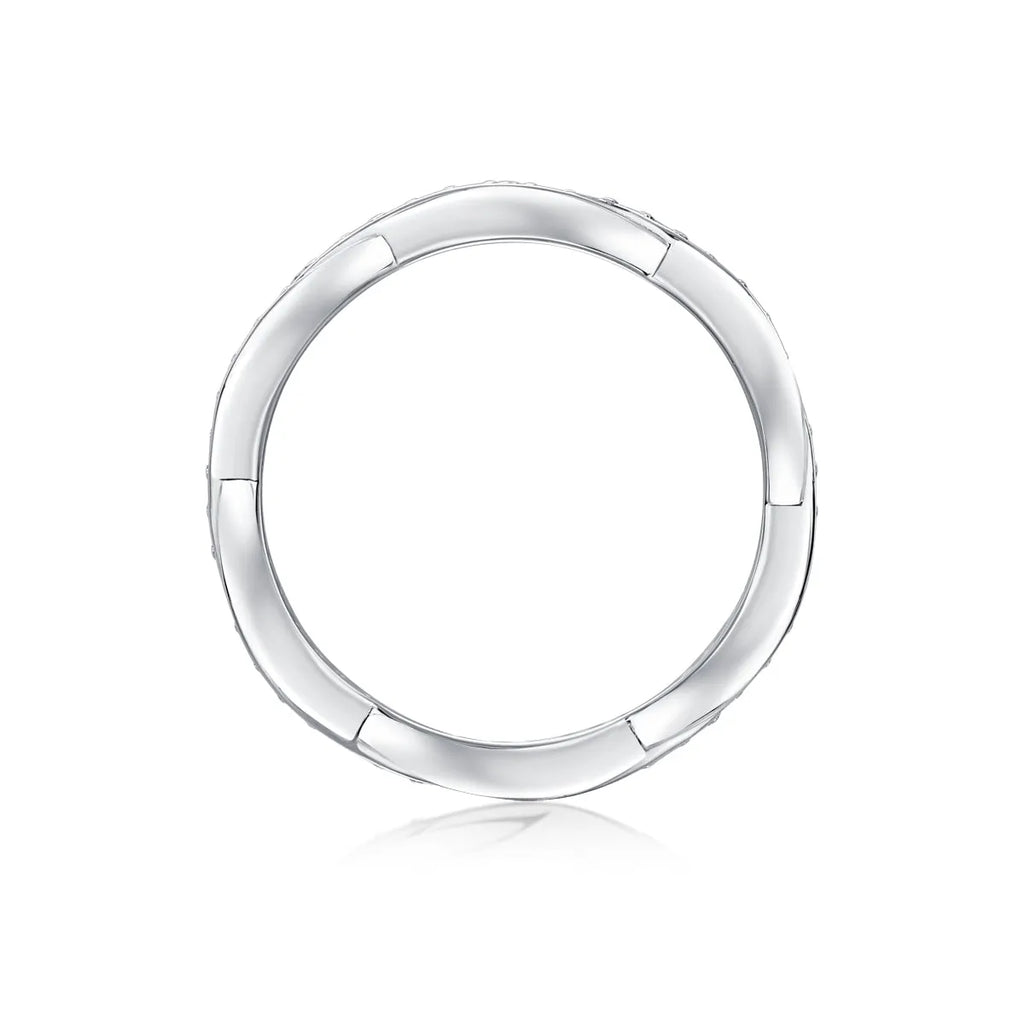 Moissanite wedding ring set in S925 silver with platinum plating on a white background