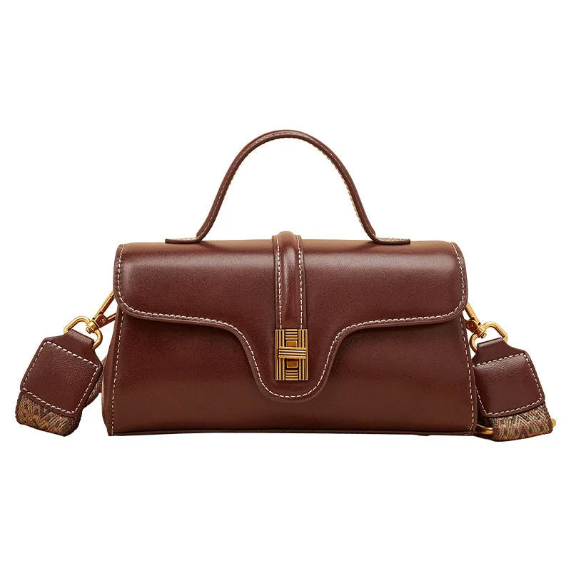 Brown Cambridge leather messenger bag with lock closure showing clamshell opening and internal organisers