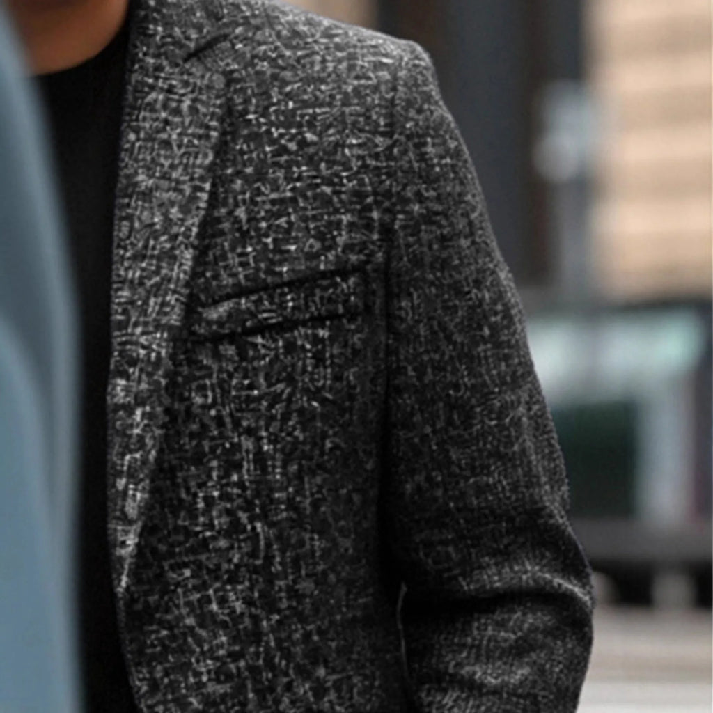 Men's single-breasted leisure suit jacket in polyester slim fit with size patch pockets, black colour, front view