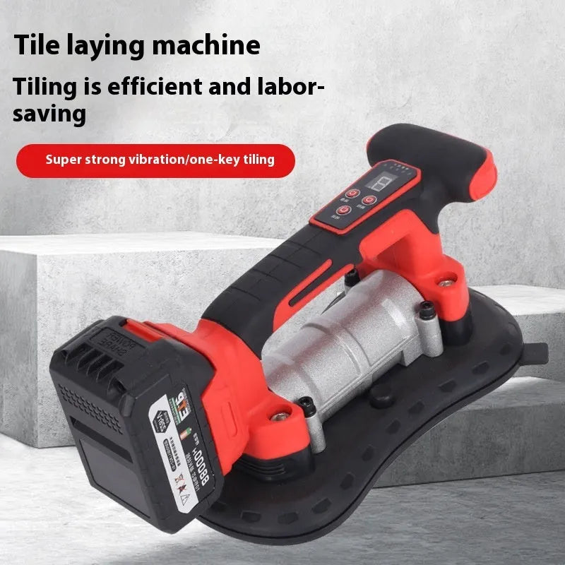 Cordless 21V electric tile laying machine with battery on a large format tile.