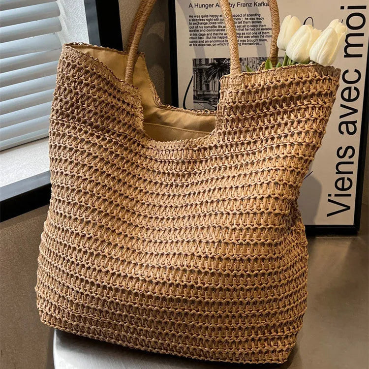 Women's large capacity straw bag in beige with canvas lining and double shoulder straps