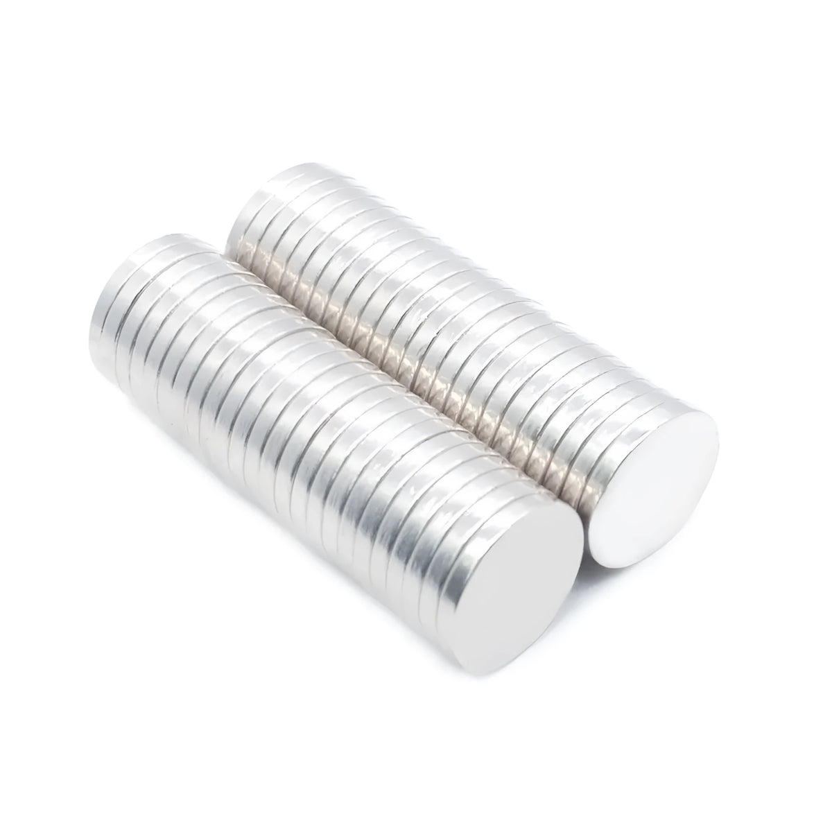 Silver neodymium magnet disc 14x2mm on plain background