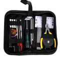 Black plastic and metal guitar repair tool kit for guitar, bass, mandolin, and banjo maintenance