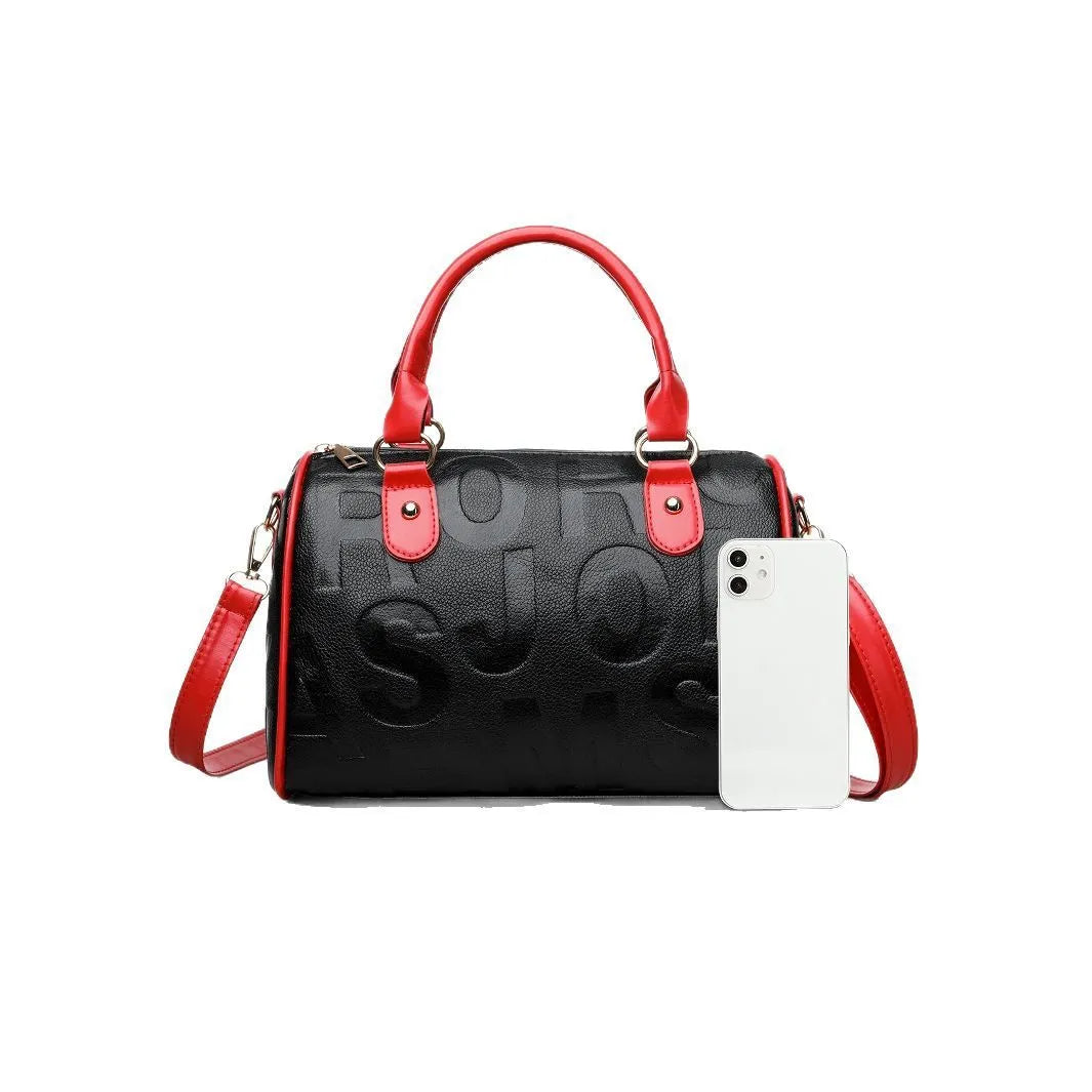 Brown cylindrical PU leather crossbody bag with three shoulder straps showing interior polyester lining