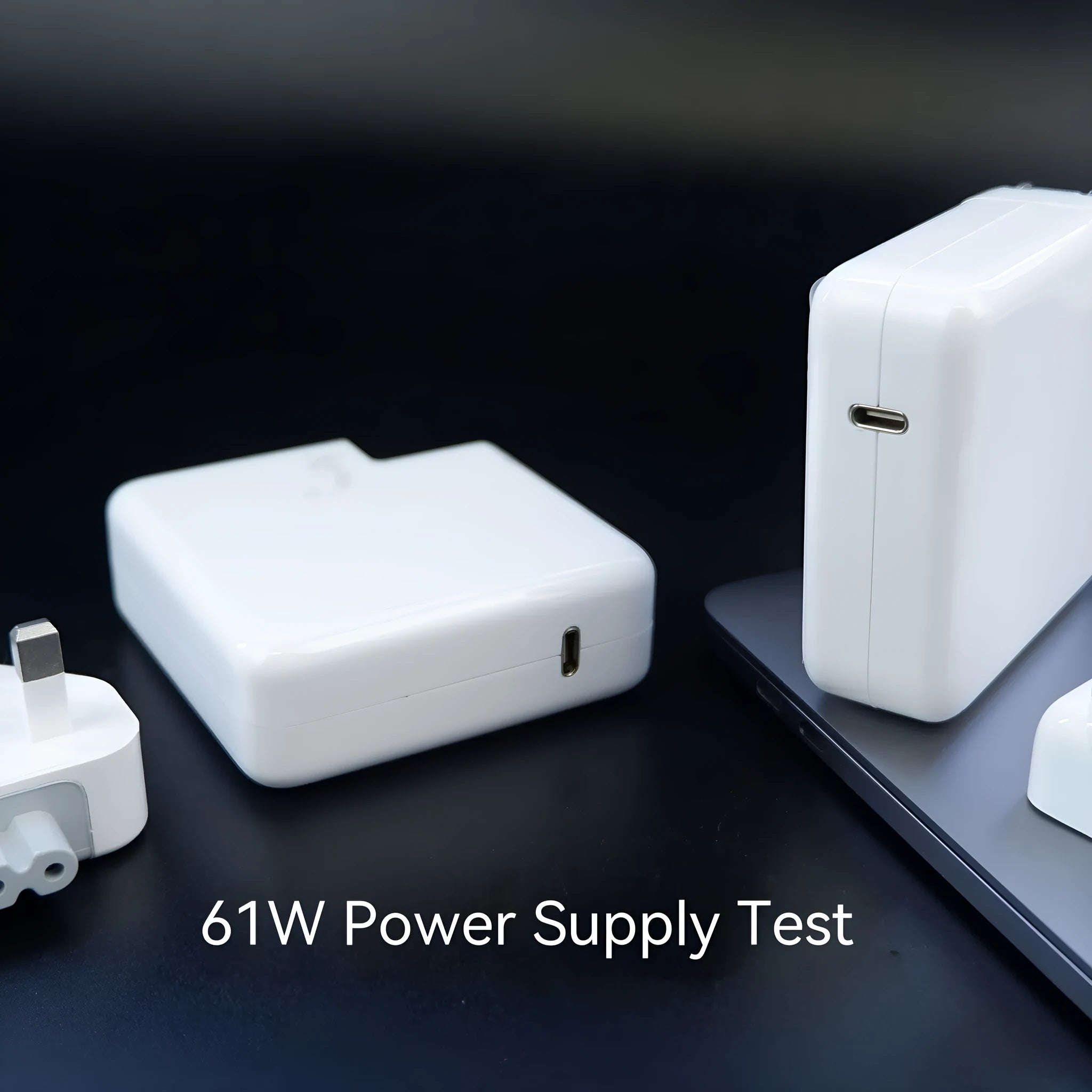 Laptop power adapter charger with USB C-to-C cable showing compact size
