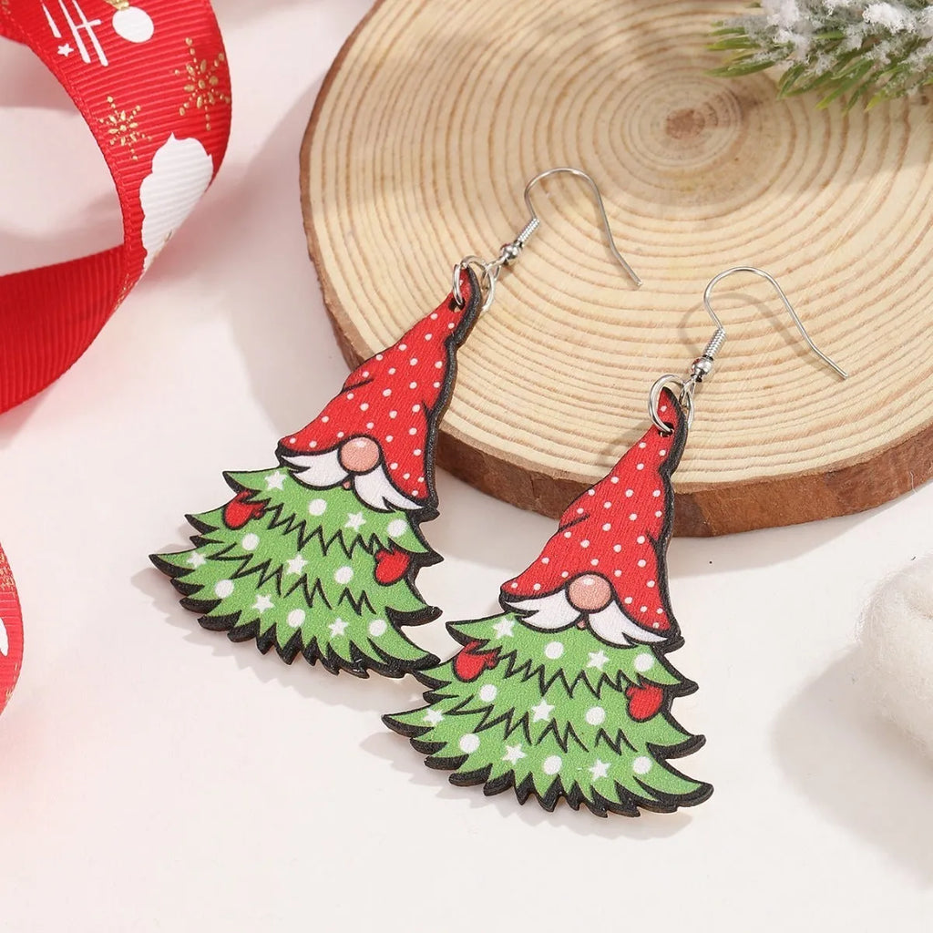Wooden Christmas earrings with printed Santa Claus designs in geometric shapes