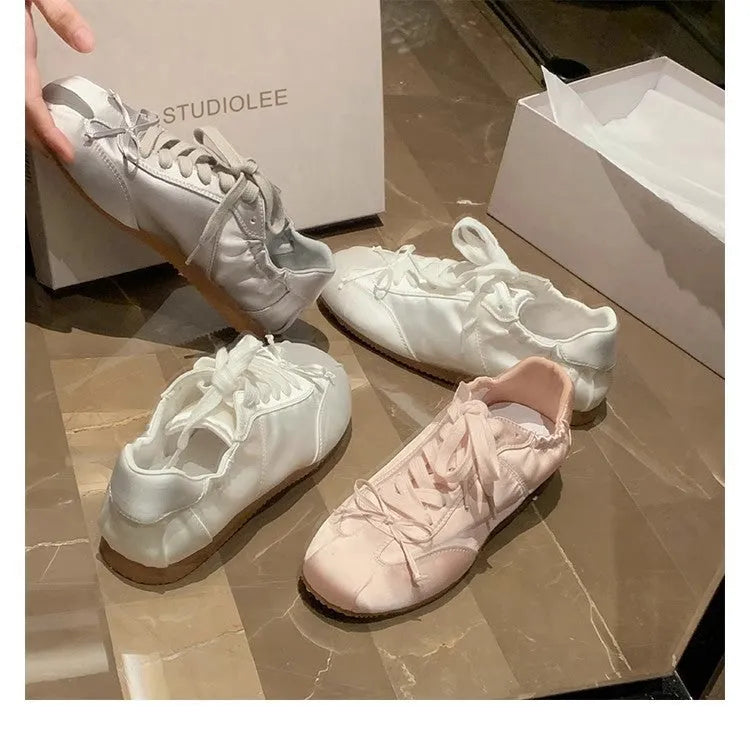 Women's satin ballet flat shoes with round toe and front lace-up in three colour options