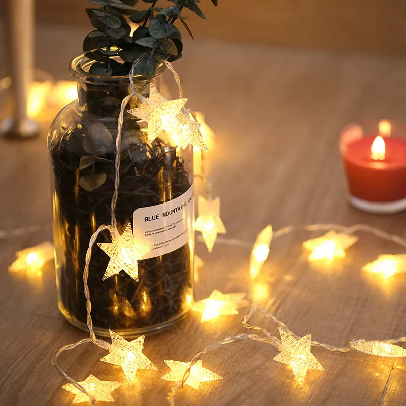 Battery-operated Christmas curtain garland string light with transparent wire, plastic stars and fur balls for window decoration