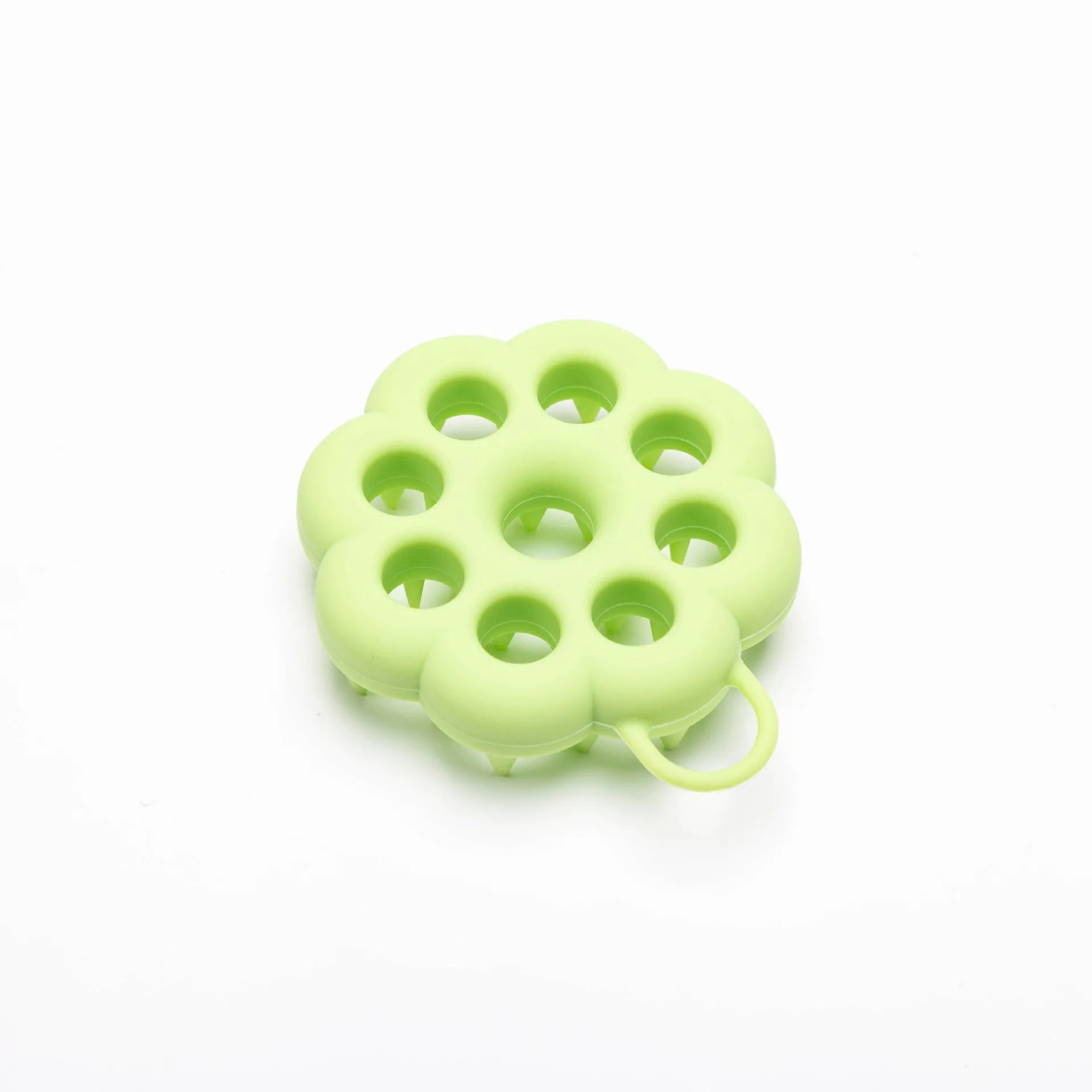Silicone pet grooming brush with coloured ergonomic handle and flexible massage bristles for dogs and cats.