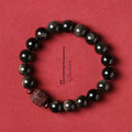 Golden obsidian bracelet with 10mm round beads in hand-woven retro design