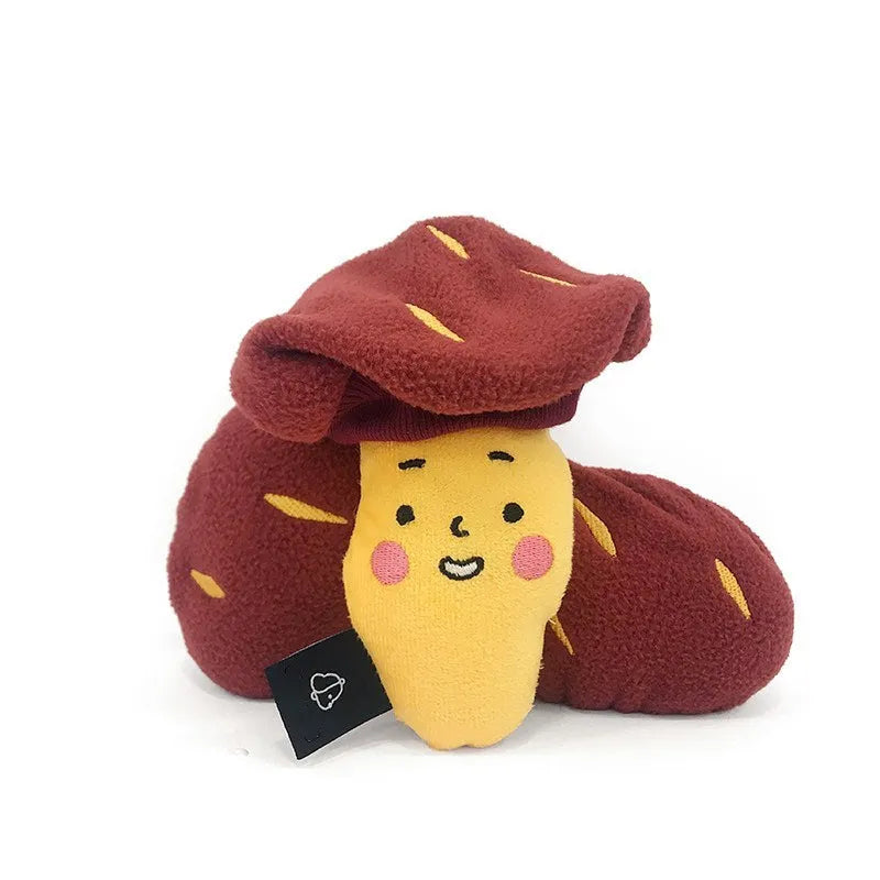 Red sweet potato pet toy with a peel-off layer and hidden treat pocket for dogs and cats.