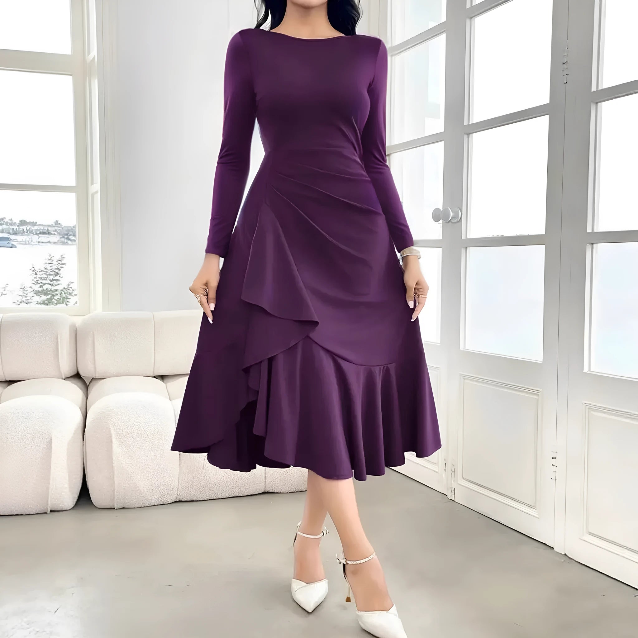 Purple women's long sleeve dress with round neck, mid waist, and ruffle detailing on a hanger.